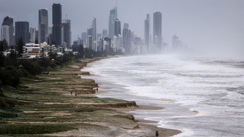 Cyclone Alfred downgraded as millions of Australians stay indoors